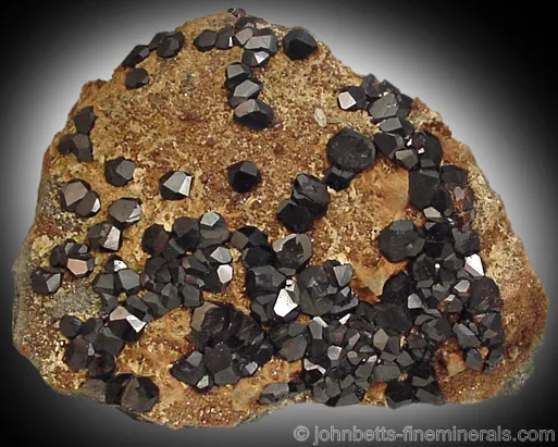 Dark Andradite Crystals on Matrix