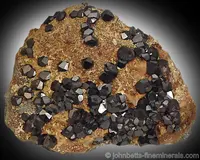 Dark Andradite Crystals on Matrix