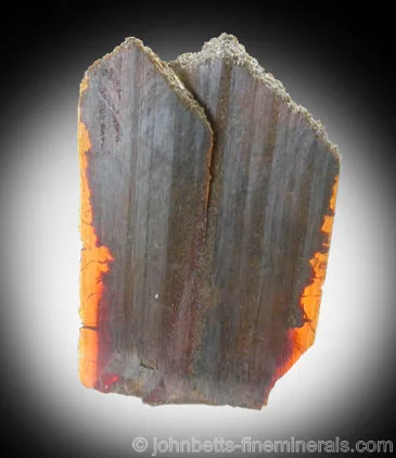 Color-Zoned Orange Brookite