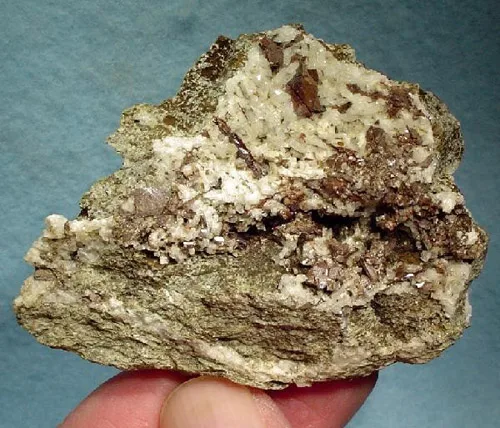 Brookite on Albite