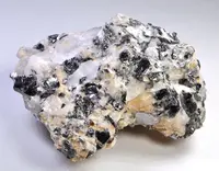 Graphite Flakes on Calcite