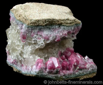 Liddicoatite Crystals Lining Cavity