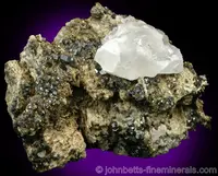 Magnesite on Matrix with Andradite