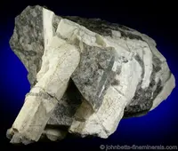 Gray-White Meionite in Quartz