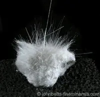 Mesolite Hairs on Thomsonite