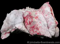 Red Metastibnite on Matrix