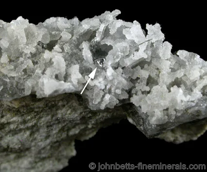 Small Native Tellurium Crystal on Quartz