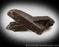 Brown Intersecting Neptunite Crystals