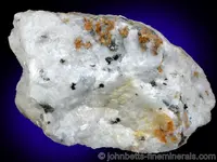 Norbergite with Graphite in Marble