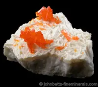 Bright Orange Orpiment on Barite