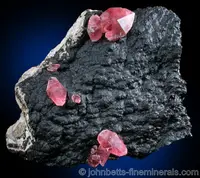 Rhodochrosite on Pyrolusite