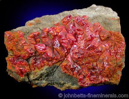 Dense Realgar Crystals Covering Matrix