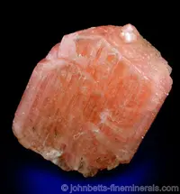 Salmon-colored Serandite