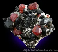 Spessartine on Smoky Quartz