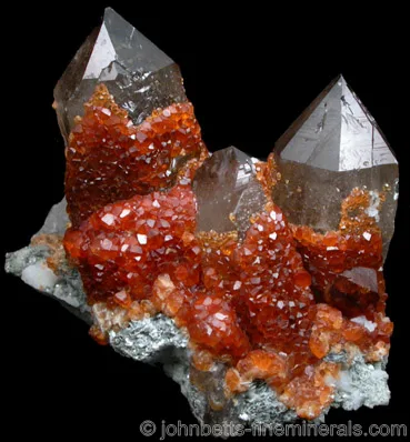 Spessartine on Smoky Quartz