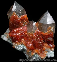 Spessartine on Smoky Quartz