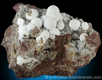 White Thomsonite on Dark Matrix