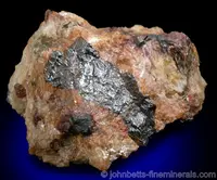 Uraninite in Albite
