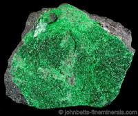 Tiny Uvarovite Crystals On Matrix